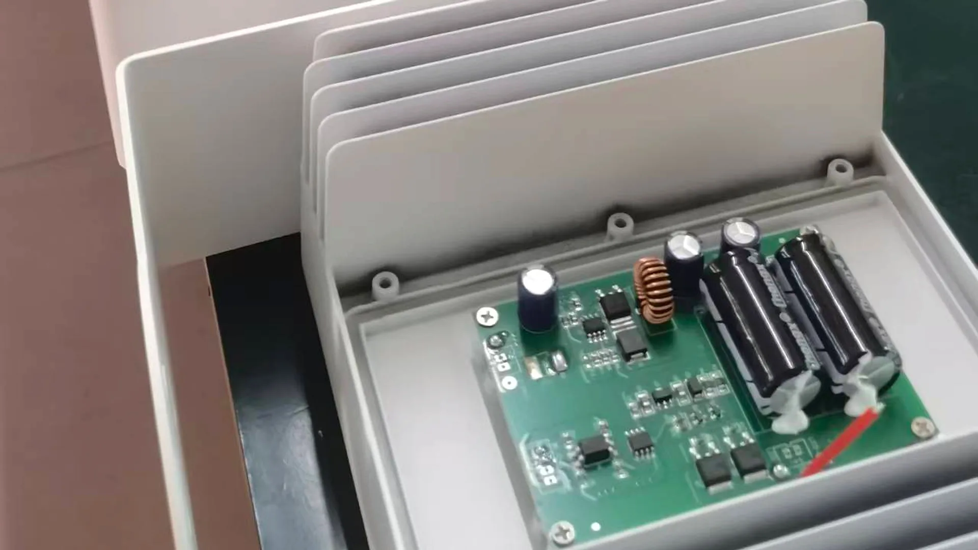 IR illuminator driver board installed inside fixture housing